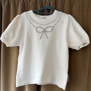 Elegant Ivory Sweater with Puff Sleeves and Rhinestone Bow
